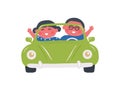 Cute little children in green car. Kids smiles and waves their hands. Boy and Girl ride a retro car. Green cabriolet Royalty Free Stock Photo