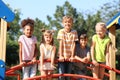 Cute little children having fun on playground outdoors Royalty Free Stock Photo