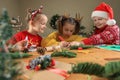 Cute little children making Christmas greeting cards at home Royalty Free Stock Photo