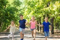 Cute little children playing in green park Royalty Free Stock Photo