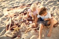 Cute little children playing with sea shells on beach Royalty Free Stock Photo