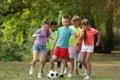 Cute little children playing with soccer ball Royalty Free Stock Photo