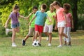 Cute little children playing with soccer ball Royalty Free Stock Photo
