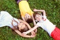 Cute little children resting in park on summer day Royalty Free Stock Photo