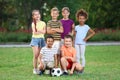 Cute little children with soccer ball in park Royalty Free Stock Photo