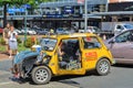 A yellow Mini, decorated for a Christmas parade in Rotorua, New Zealand