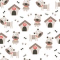 Cute little dogs and dog house seamless pattern Royalty Free Stock Photo