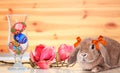 Cute little easter bunny and easter decoration on white table Royalty Free Stock Photo