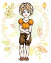 Cute little fair-haired girl standing on background of autumn la