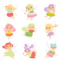 Cute Little Fairies in Colorful Dresses set, Lovely Winged Flying Girls with Magic Wands Vector Illustration Royalty Free Stock Photo