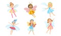 Cute Little Fairies in Colorful Dresses with Wings Set, Beautiful Girls in Fairy or Elf Costumes Vector Illustration Royalty Free Stock Photo