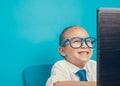 Cute little girl as businesswoman using laptop computer Royalty Free Stock Photo