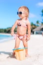 Adorable little girl have fun at tropical beach during vacation Royalty Free Stock Photo