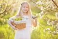 Cute little girl in blossom apple tree garden Royalty Free Stock Photo