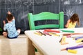 Cute little girl and boy drawing and painting at kindergarten. Creative activities kids club Royalty Free Stock Photo