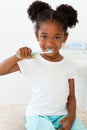 Cute little girl brushing her teeth Royalty Free Stock Photo