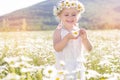 Cute little girl in the chamomile field Royalty Free Stock Photo