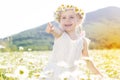 Cute little girl in the chamomile field Royalty Free Stock Photo