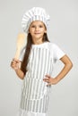 Cute little girl in chef hat and apron Royalty Free Stock Photo
