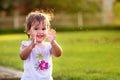 Cute little girl clapping her hands Royalty Free Stock Photo