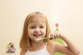 Cute little girl clean teeth