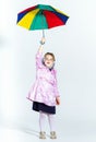 Cute little girl with colorful umbrella Royalty Free Stock Photo