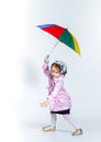 Cute little girl with colorful umbrella Royalty Free Stock Photo