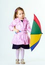 Cute little girl with colorful umbrella Royalty Free Stock Photo