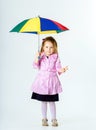 Cute little girl with colorful umbrella Royalty Free Stock Photo