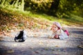 Cute little girl crying in autumn park Royalty Free Stock Photo