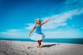 Cute little girl dance play at tropical beach Royalty Free Stock Photo