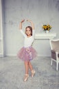 A cute little girl is dancing like a ballerina Royalty Free Stock Photo