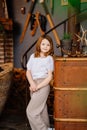 Cute little girl with dark hair in retro country house interior. Royalty Free Stock Photo