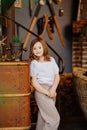 Cute little girl with dark hair in retro country house interior. Royalty Free Stock Photo