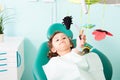 Cute little girl at dental clinic