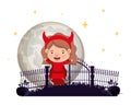 Cute little girl with devil costume in cemetery scene