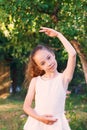 Cute little girl dreams of becoming a ballerina. Child girl in w Royalty Free Stock Photo