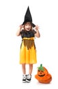 Cute little girl dressed as witch for Halloween on white background Royalty Free Stock Photo