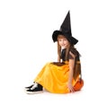 Cute little girl dressed as witch for Halloween on white background Royalty Free Stock Photo