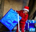 Cute little girl dressed in red santa hat Royalty Free Stock Photo