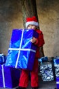 Cute little girl dressed in red santa hat Royalty Free Stock Photo