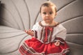 Cute little girl dressed in traditional Romanian folk costume Royalty Free Stock Photo