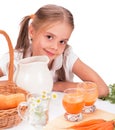 Cute little girl drink carrot juice. White background Royalty Free Stock Photo