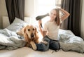 Cute Little Girl Drying Hair With A Hairdryer