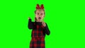 Cute little girl with ears talking spell abracadabra holding magic wand in hands