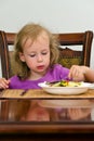 Cute little girl eating Royalty Free Stock Photo