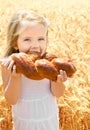 Cute little girl eating bread Royalty Free Stock Photo