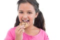 Cute little girl eating a cookie Royalty Free Stock Photo