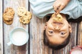 Cute little girl eating cookies with milk Royalty Free Stock Photo