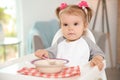 Cute little girl eating healthy food Royalty Free Stock Photo